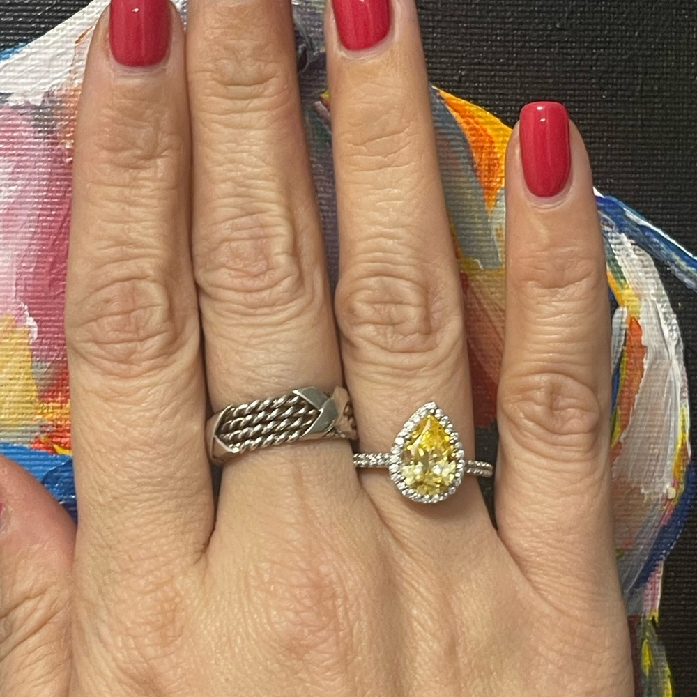 Elegant Silver and Yellow Gemstone Ring